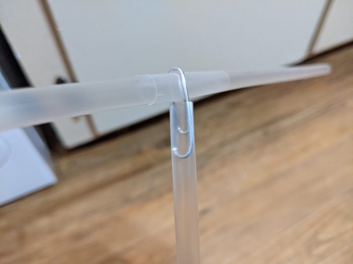 Example of a paper clip connected to two straws