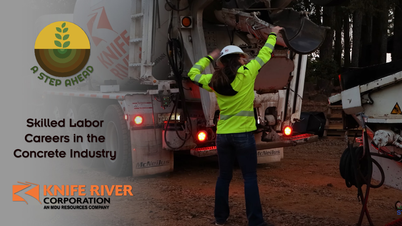 A Step Ahead Knife River video thumbnail. Woman helping a concrete truck back into a job site.