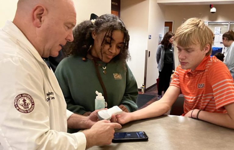 High school students learning about medical tools at COMP NW in Lebanon, Oregon